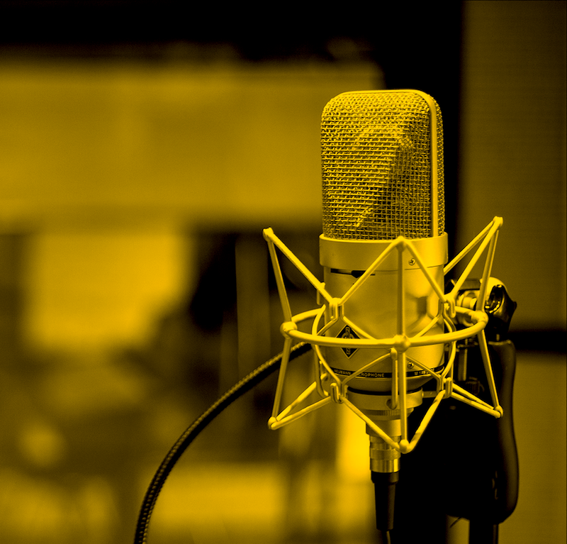 a radio microphone in a studio filtered gold